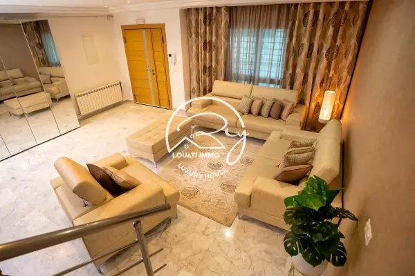 A LOUER SUPERBE DUPLEX MEUBLE AU LAC 2